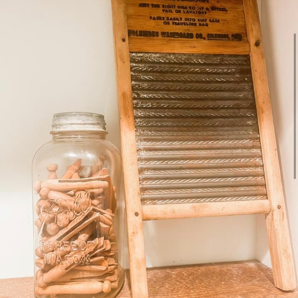 Antique scrub board and mason jar with clothes pins